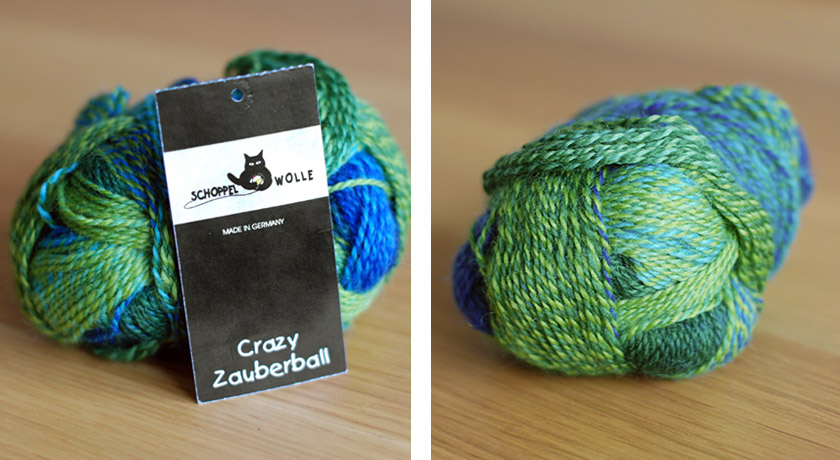 Green and blue yarn on table with tag