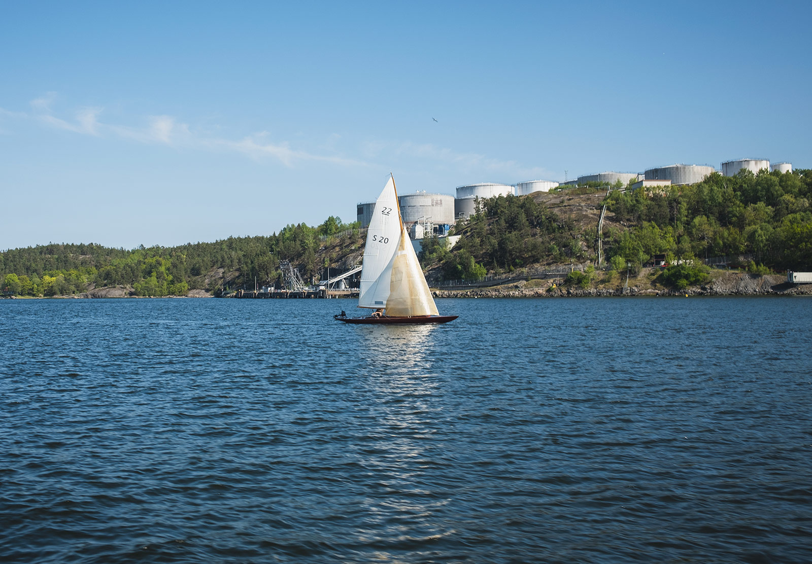 Small sail boat on the water