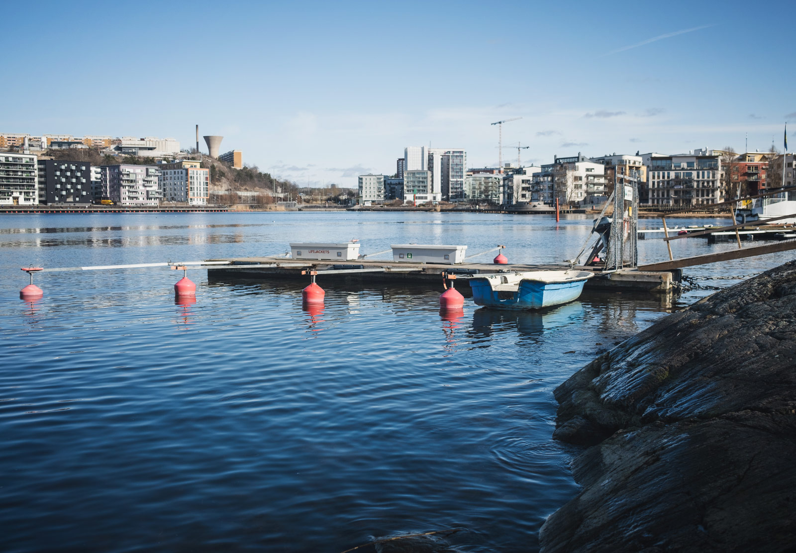Small boat sitting on water