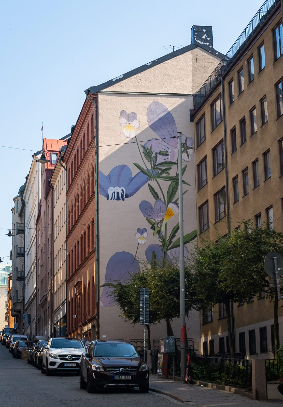 Flower mural covering side of building