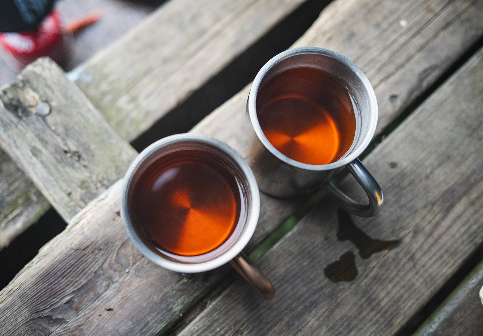 Golden tea in mugs