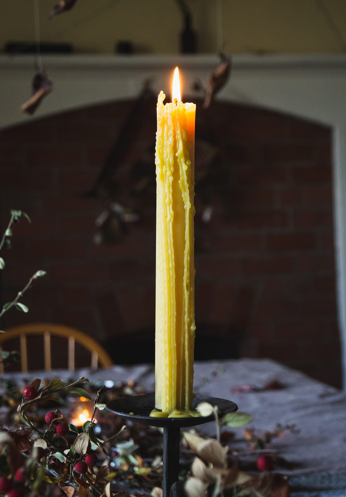 Dripping beeswax candle