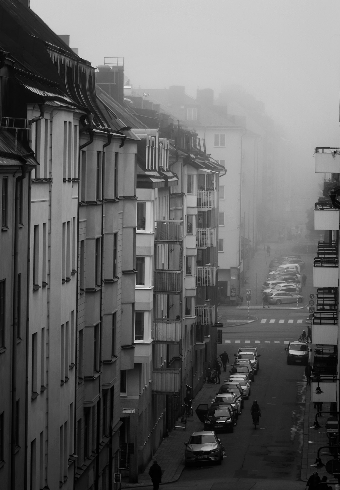 Fog covered building tops