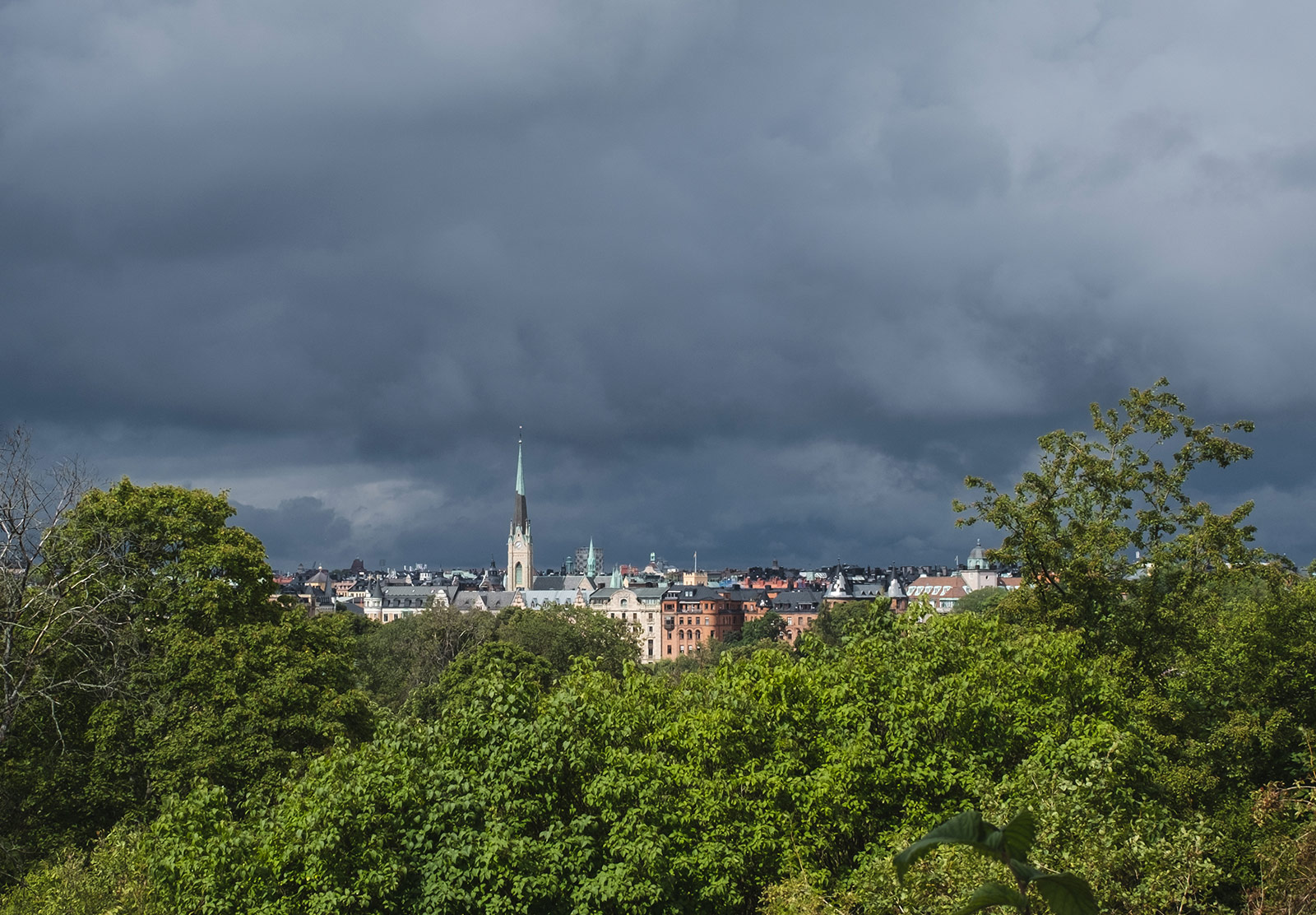Dark clouds behind church