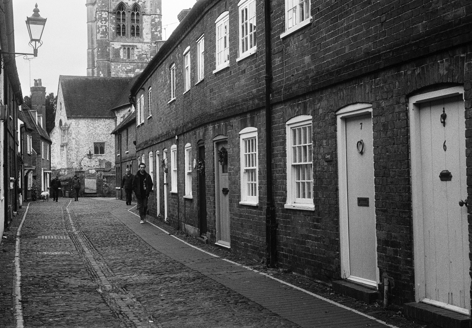 Houses lining cobbled street