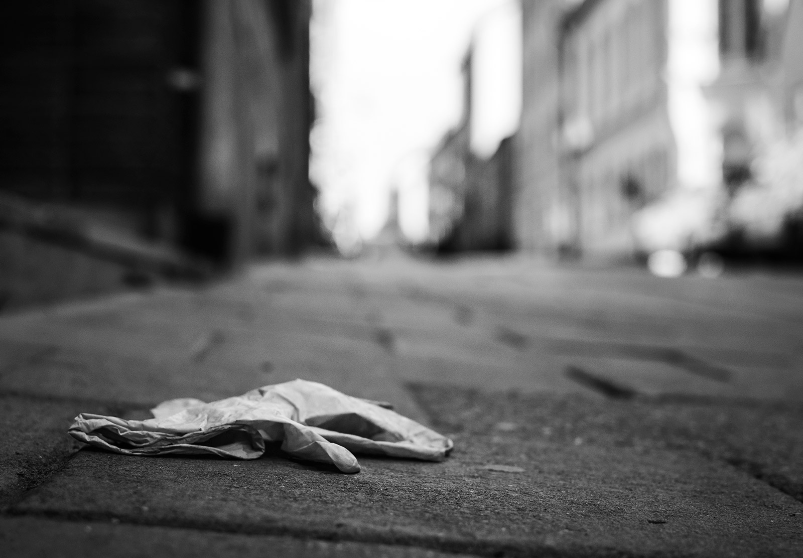 Used glove on floor