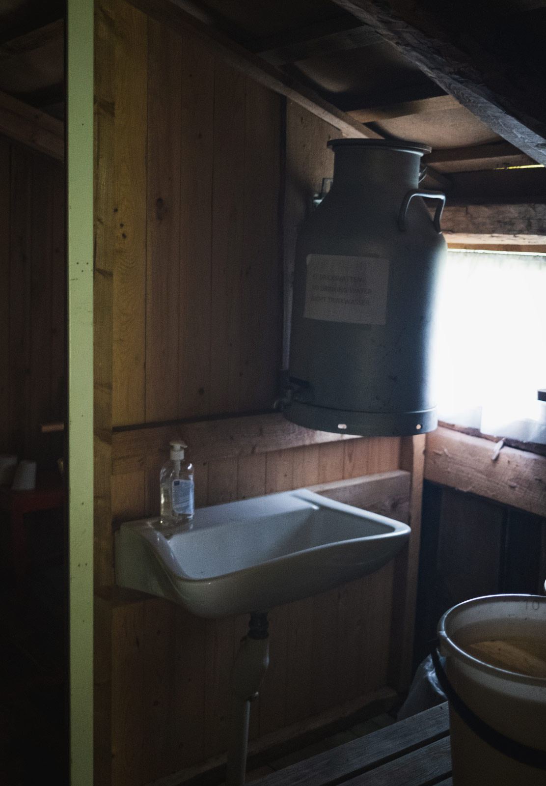 Sink inside a wooden building