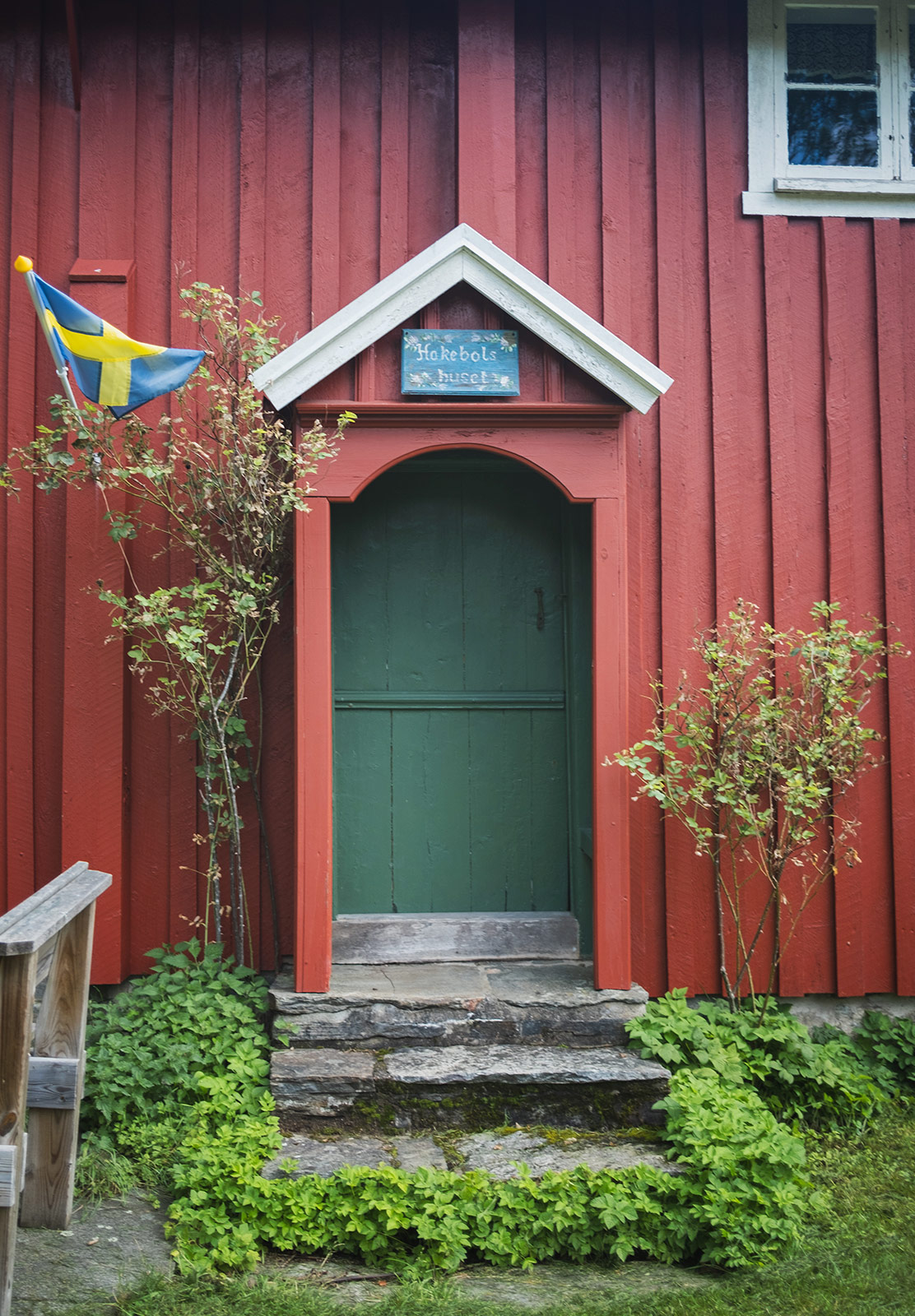 Pitched porch over a door