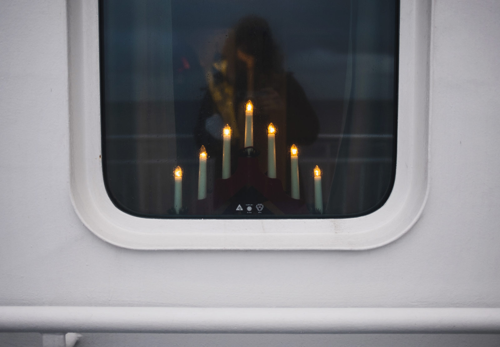 Electric candles in window