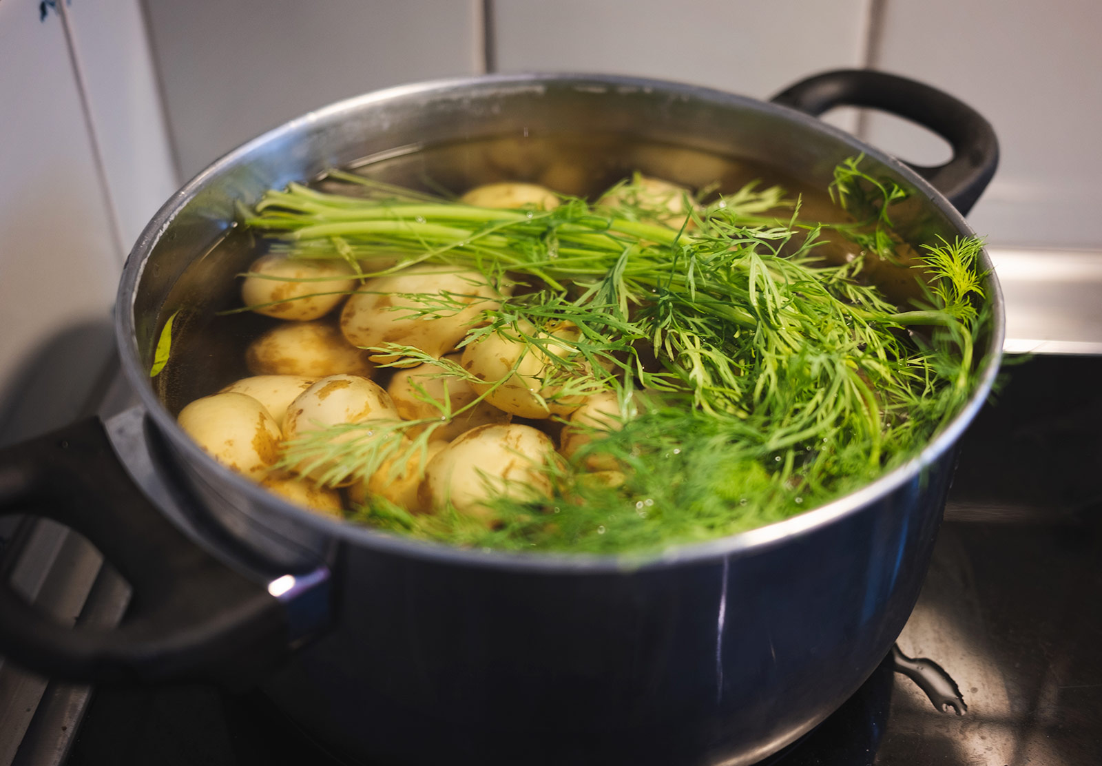 Potatoes and dill in a pan