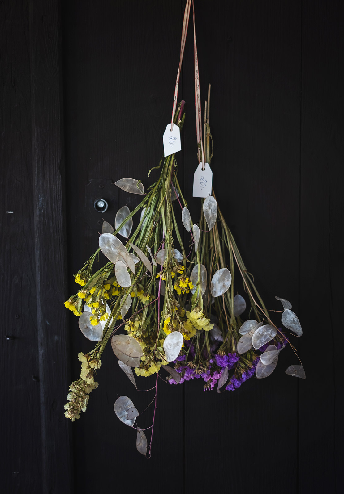 Dried flowers hanging on wall