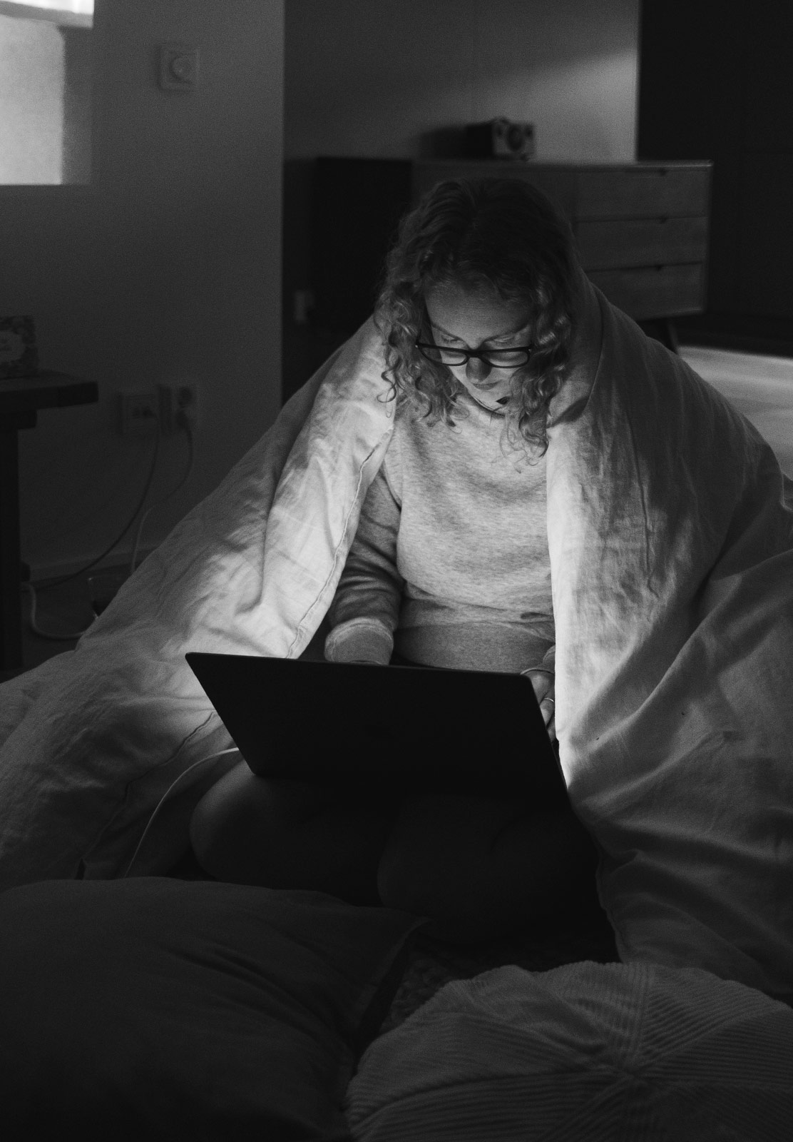 On my laptop under a duvet
