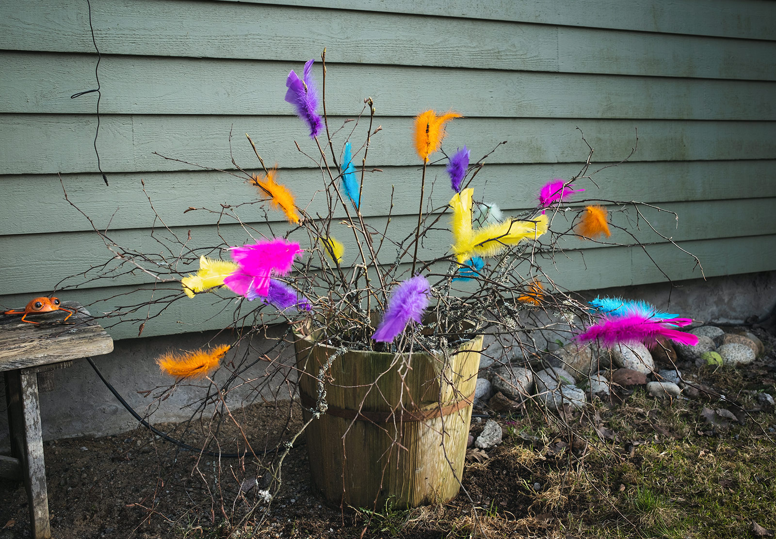 Feather tied to twigs