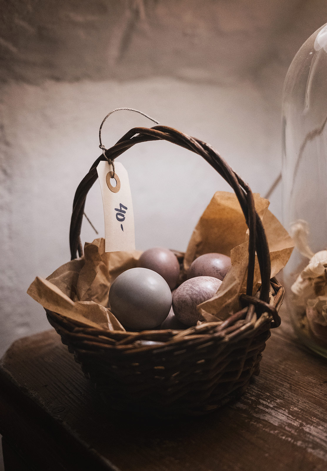 Basket of ceramic eggs
