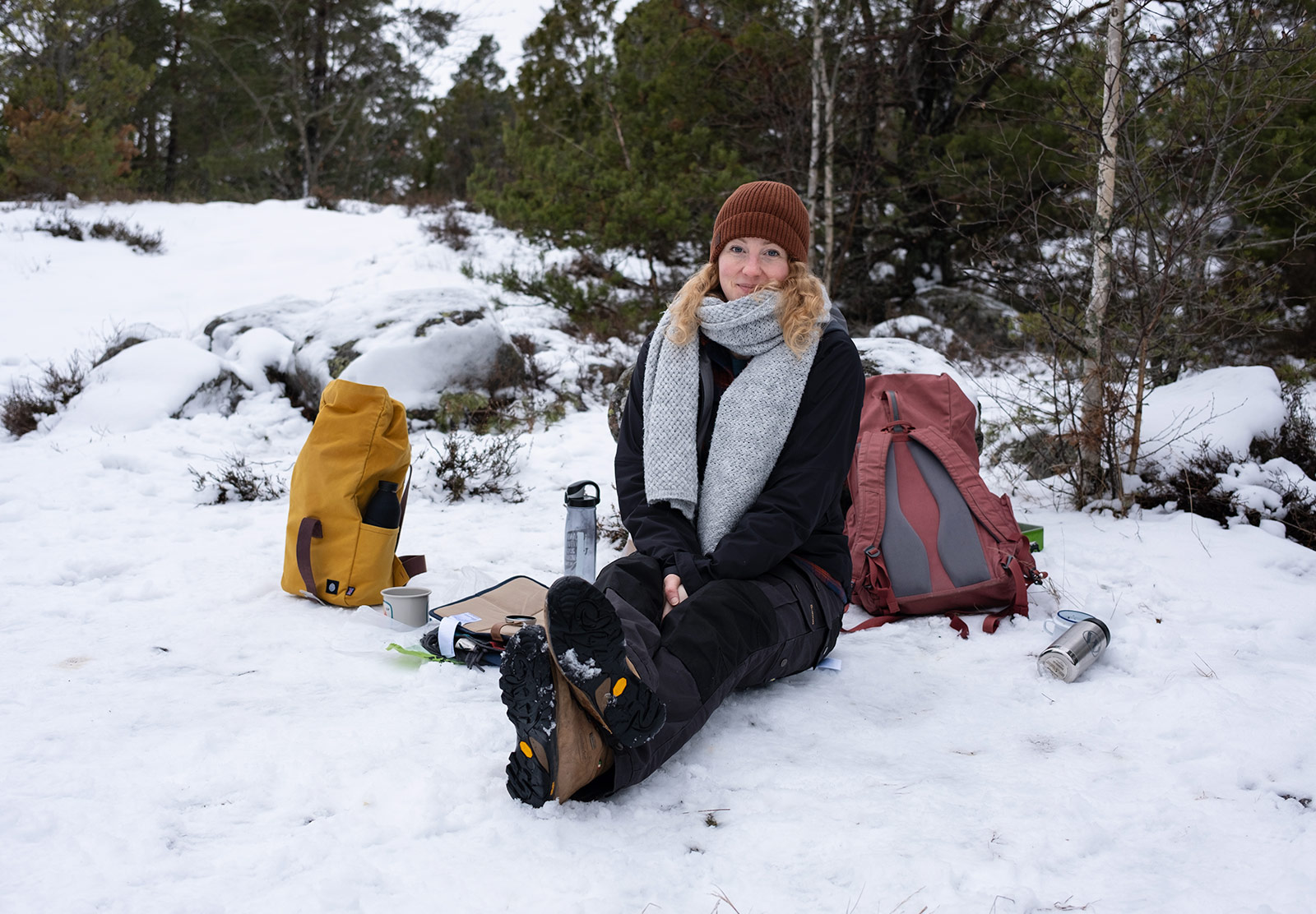 Woman sitting on the snow