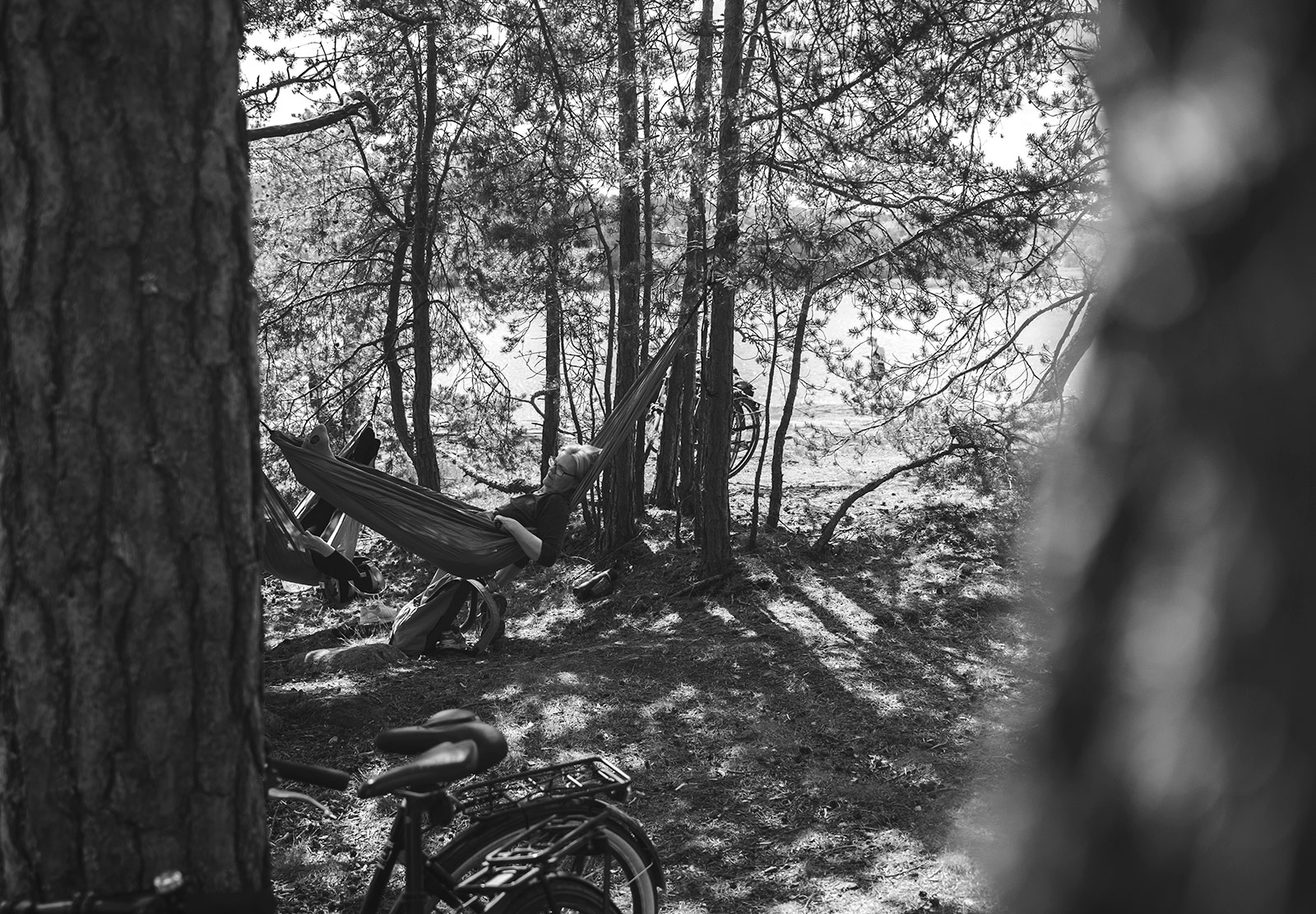 Woman sitting in hammock