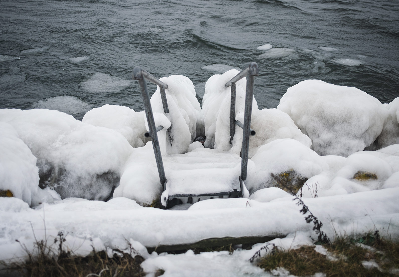 Thick ice covering steps into the sea