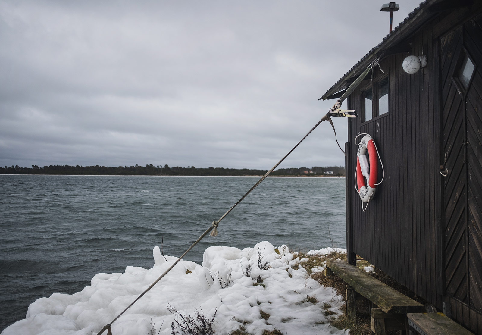 Wooden hut next to the sea