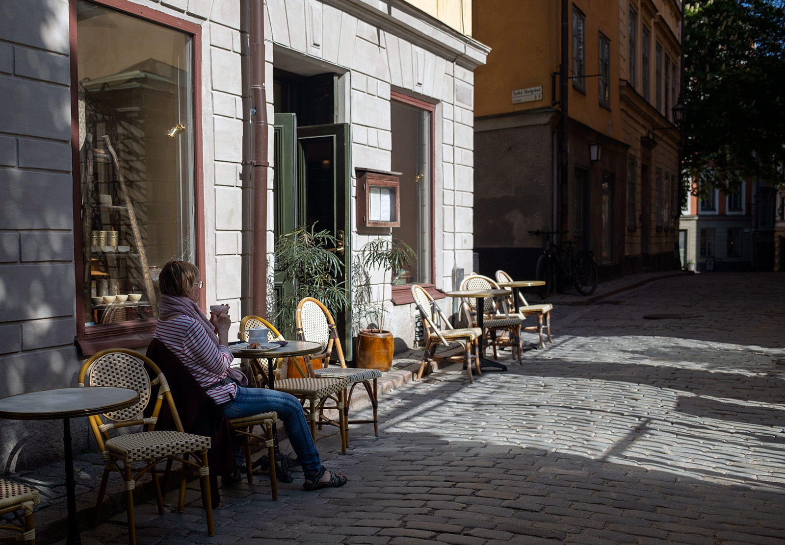 Lady sat at outdoor table