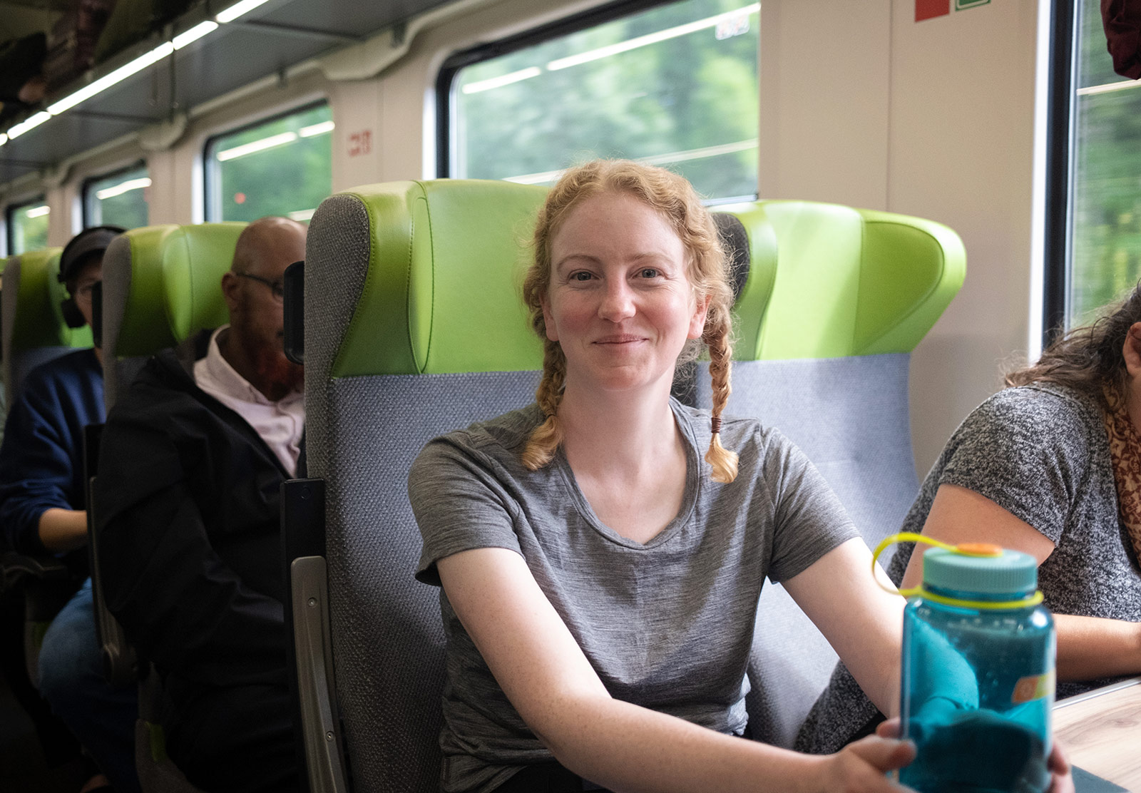 Woman sitting on train