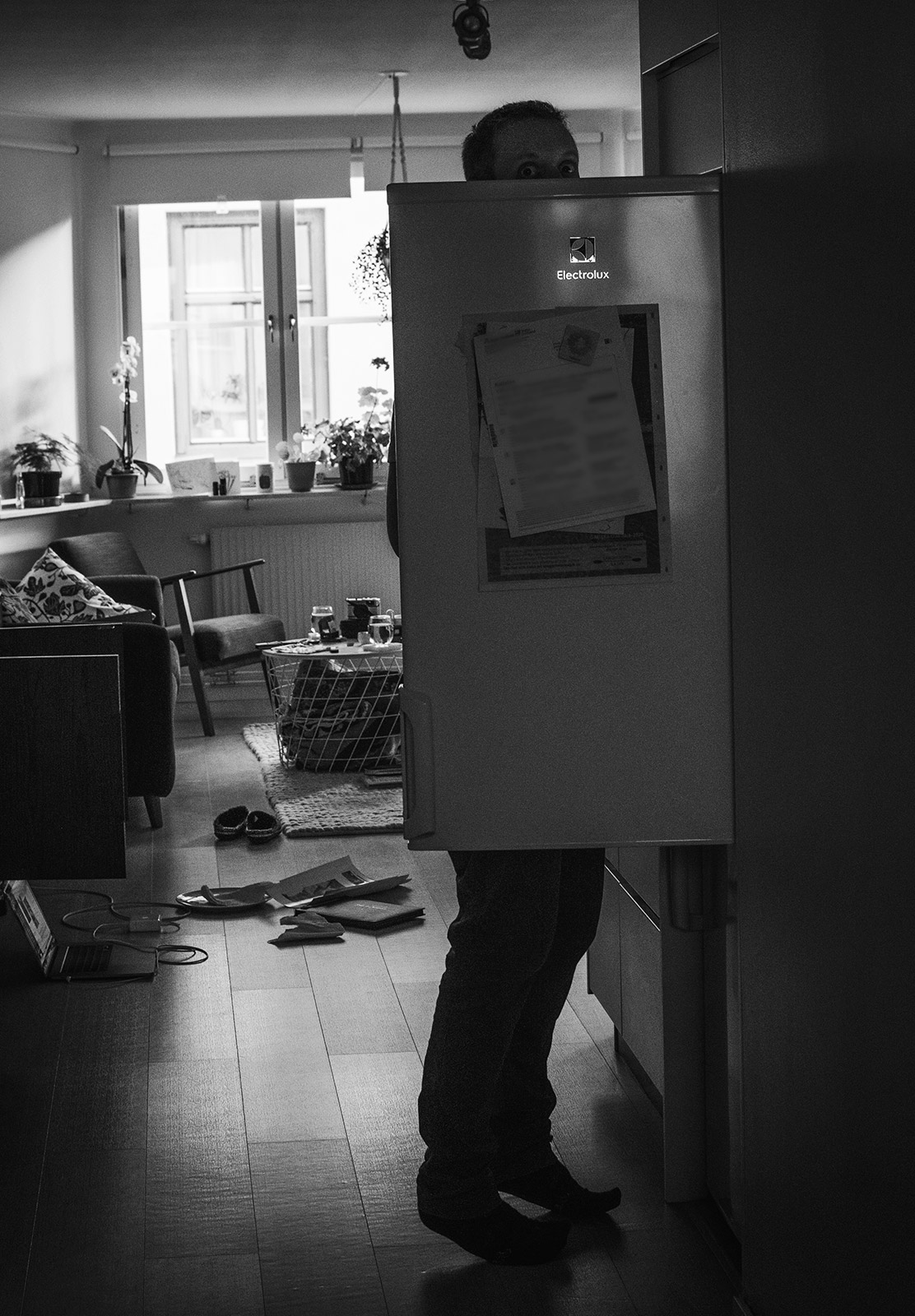 Man looking in fridge