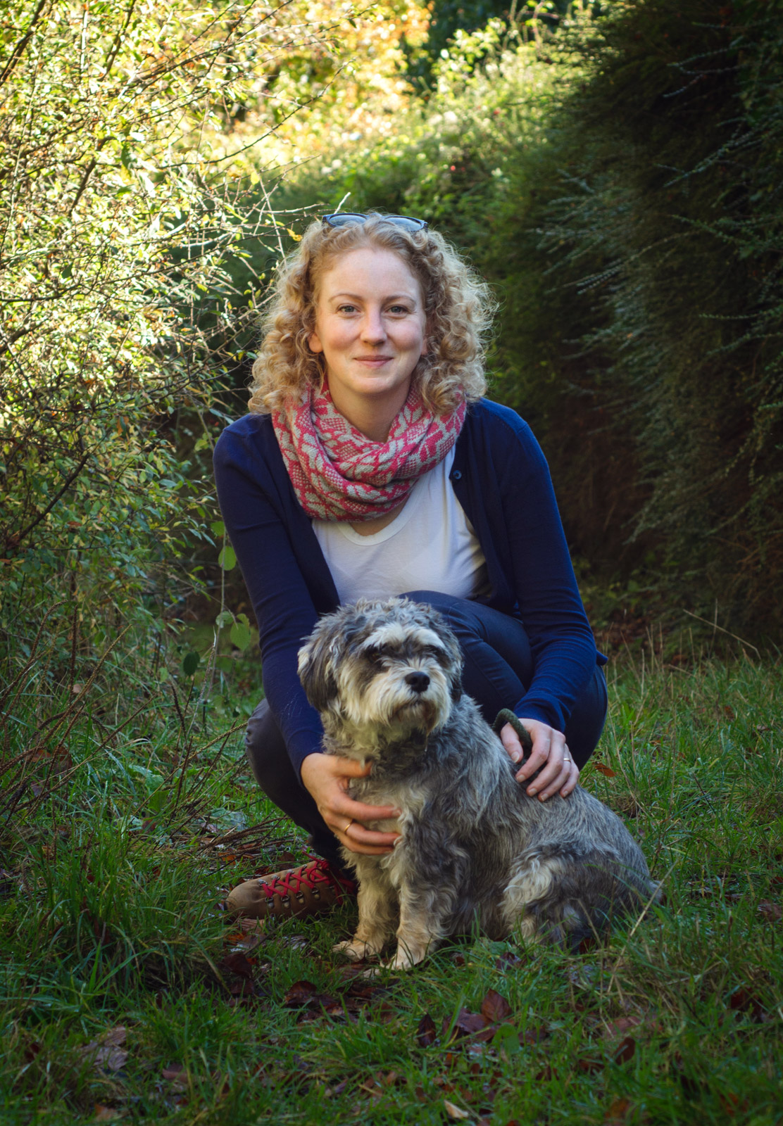 Woman in scarf with dog