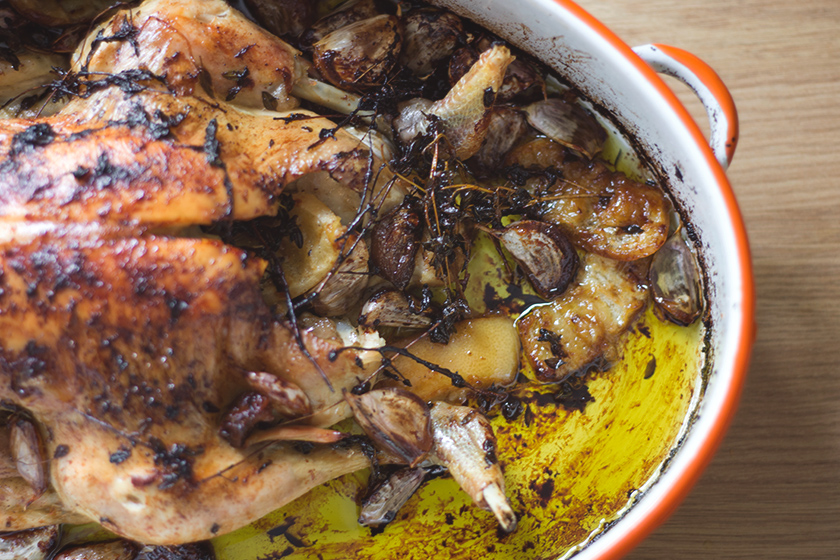 Roasted garlic and herbs in oil