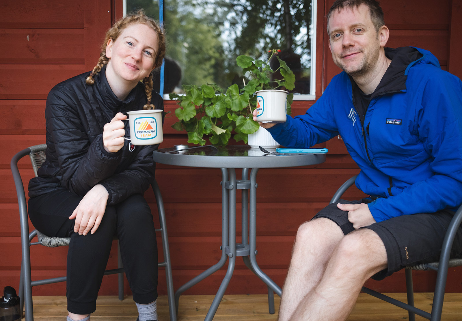Couple holding mugs