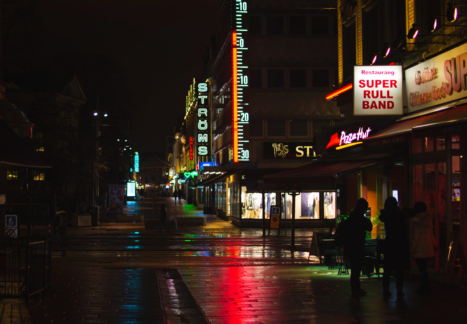 Dimly lit street at night