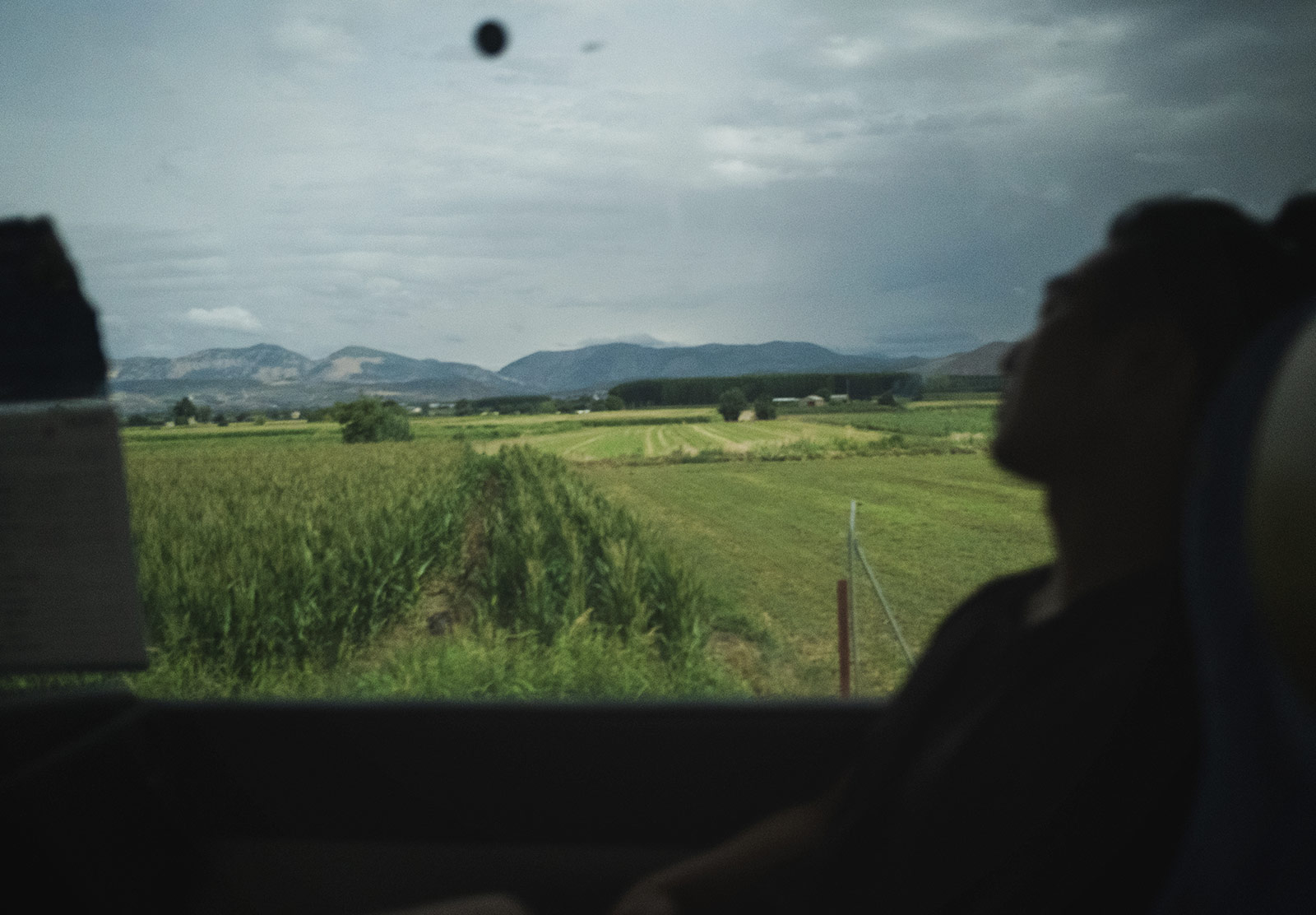 View of mountains through bus window