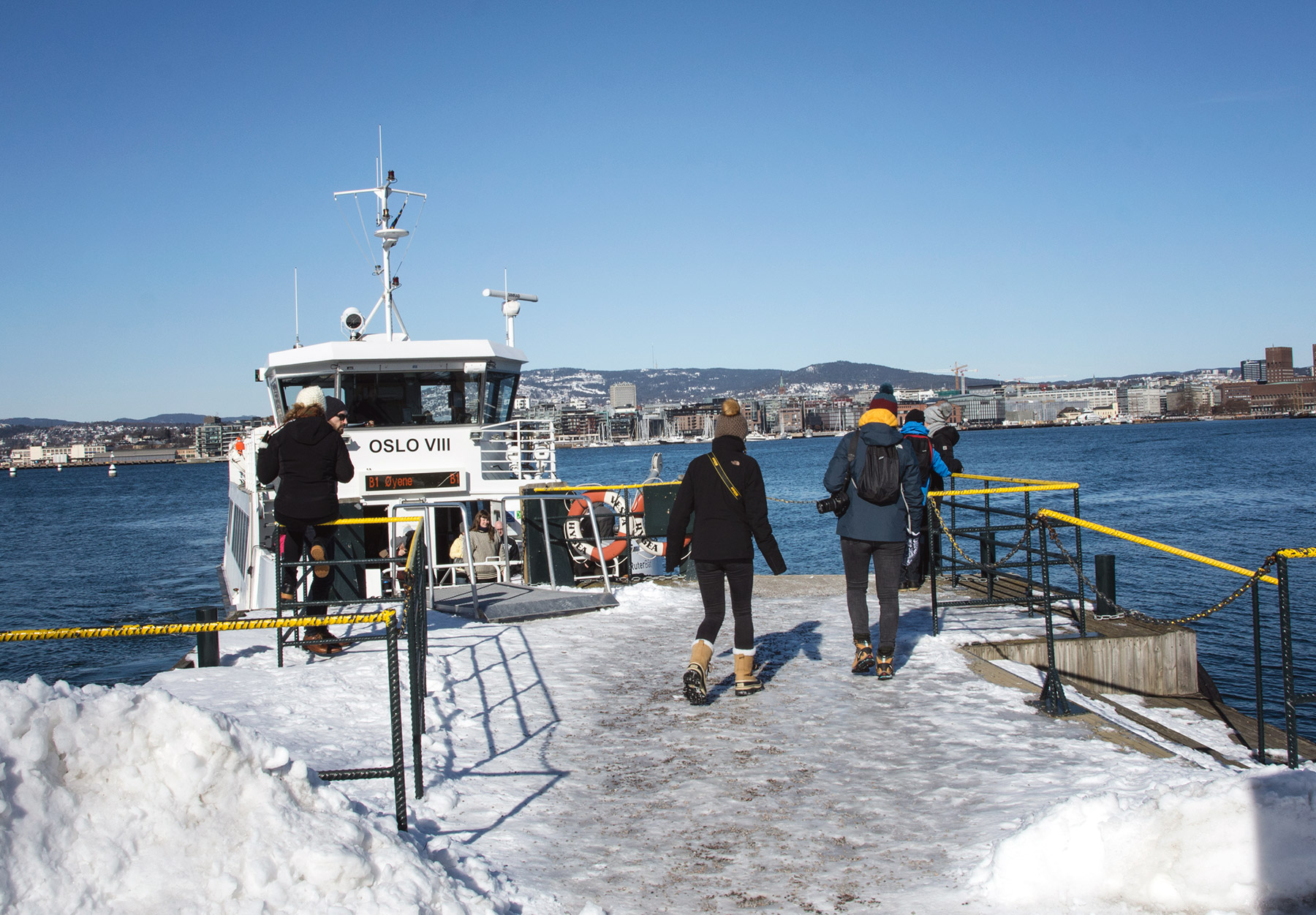 People boarding boat