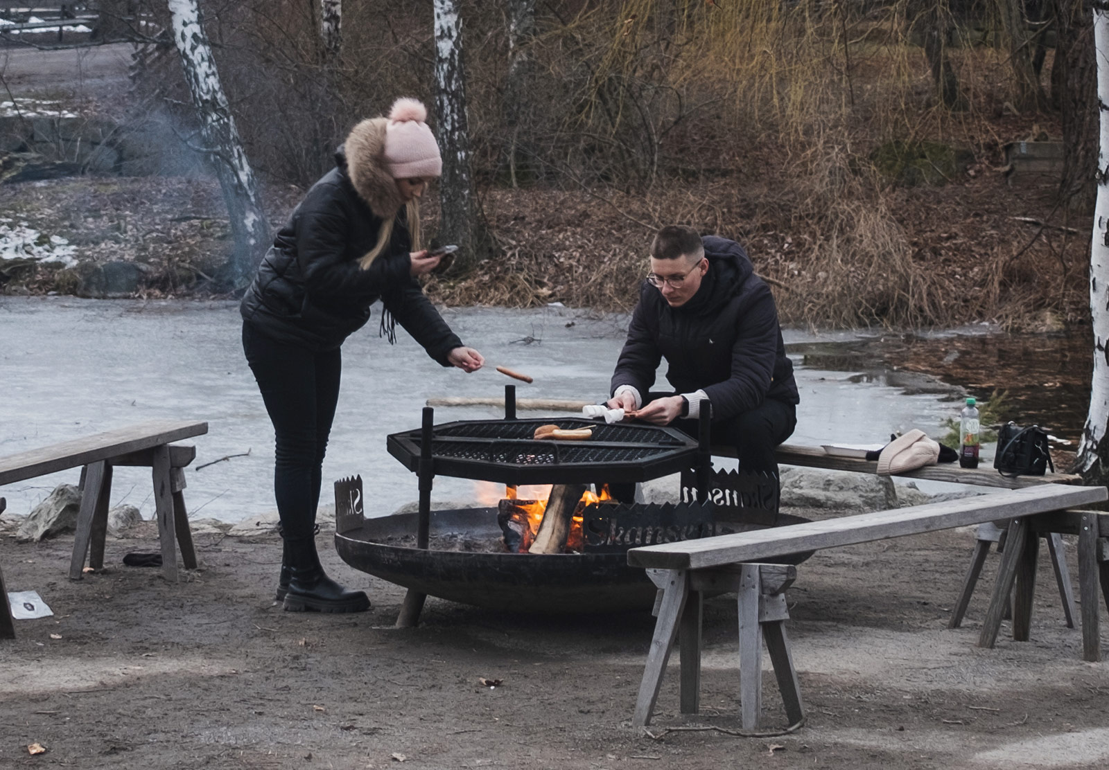 Couple grilling food