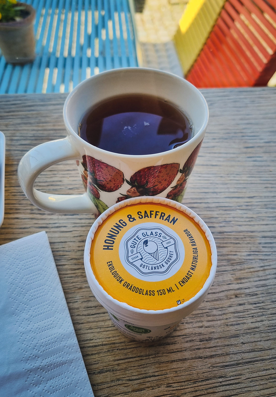 Pot of ice cream and cup of tea