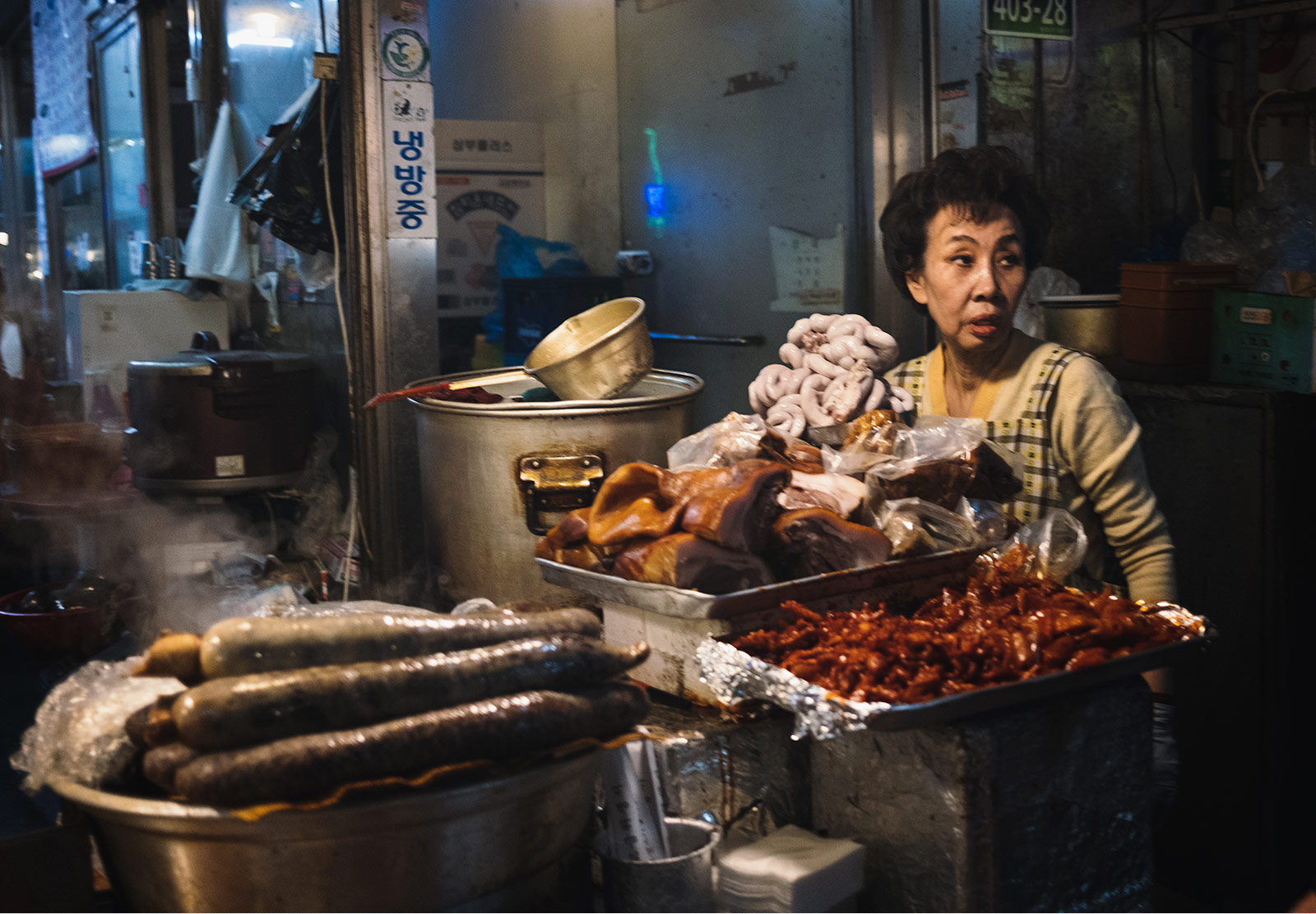 Woman standing with meat