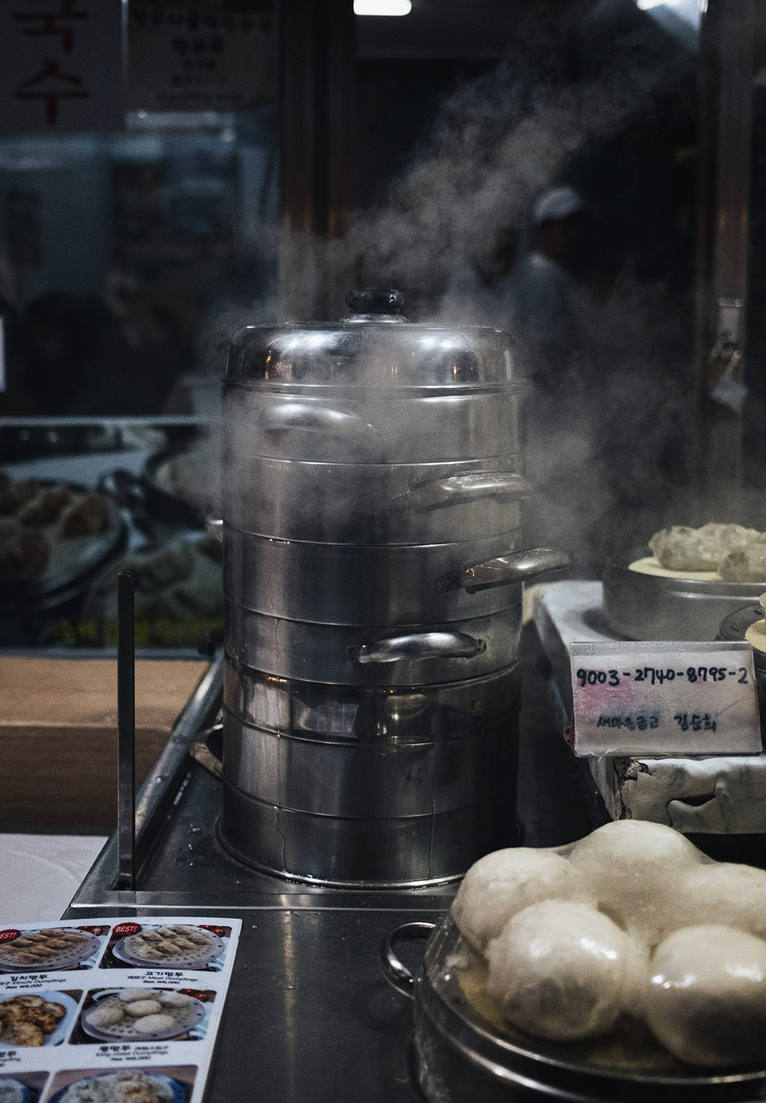 Steam coming out of stacked pots