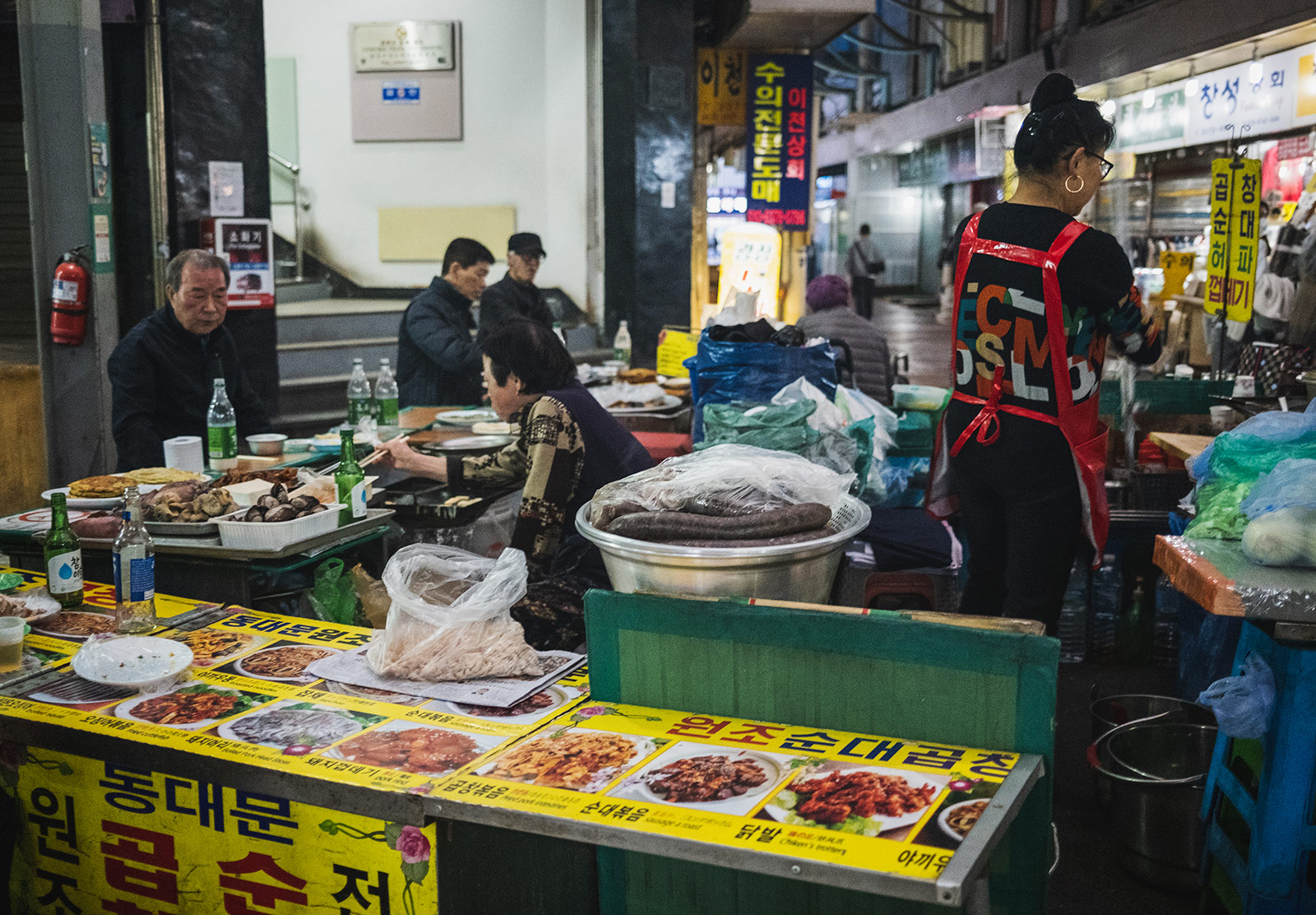 People eating at makeshift tables
