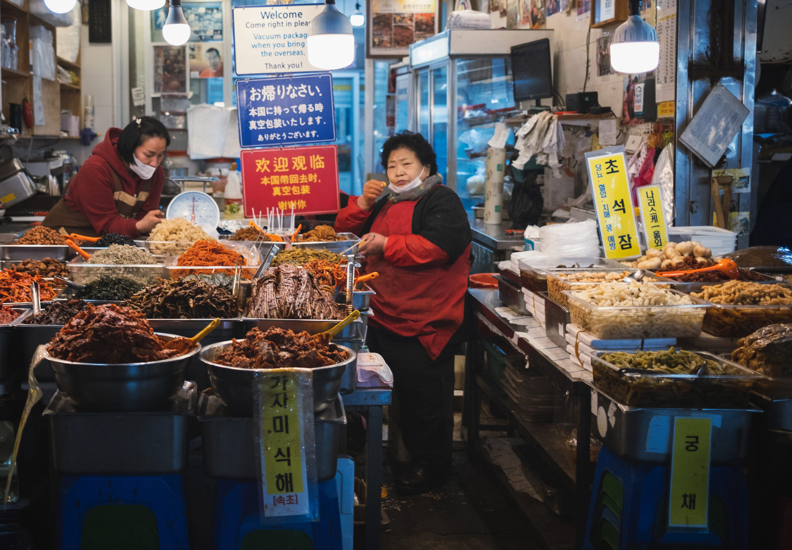 Woman standing at food stand
