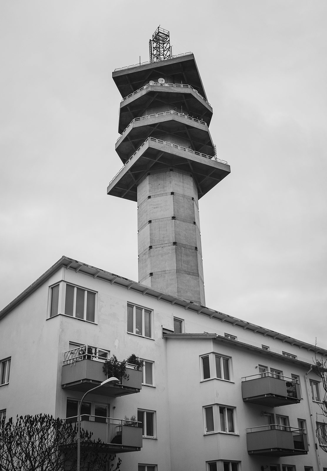 Tall tower above apartments