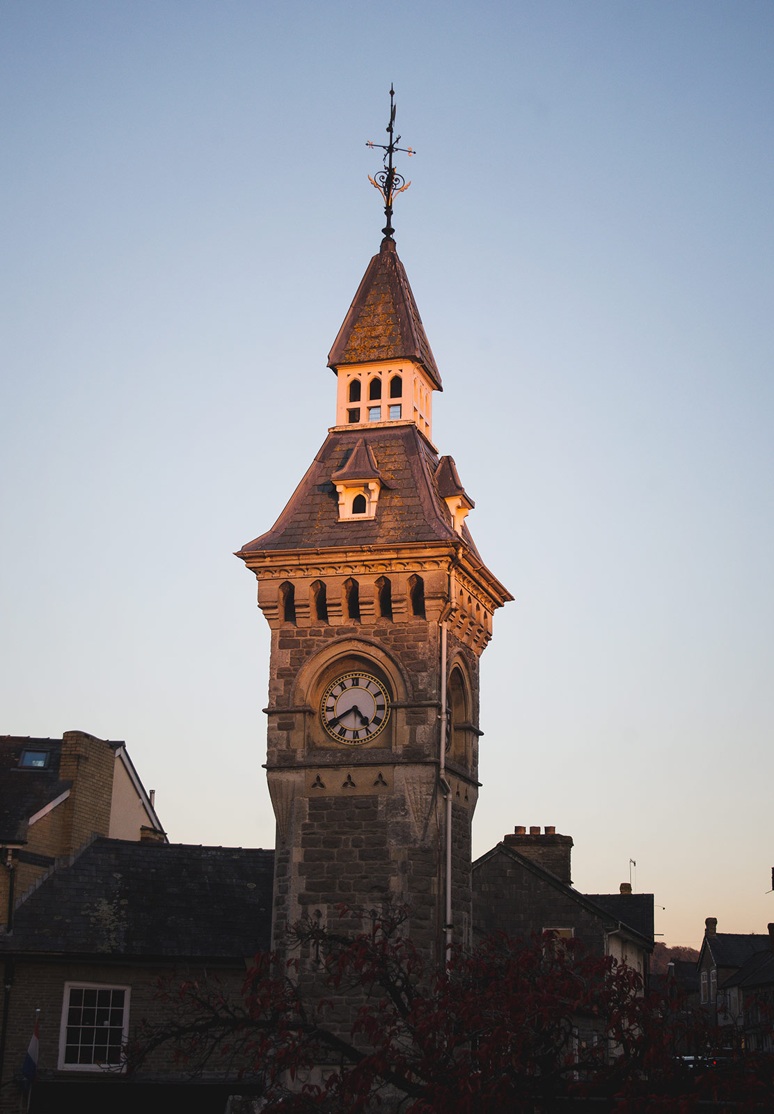 Orange light on clock tower