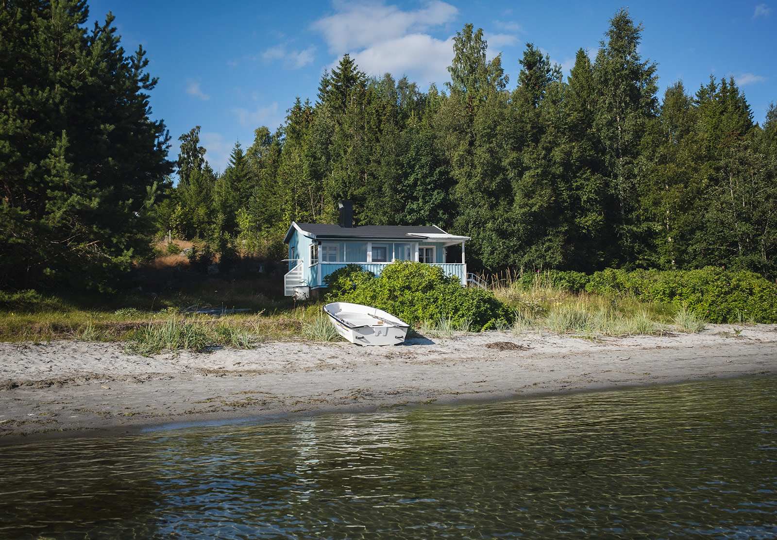 Wooden house near water