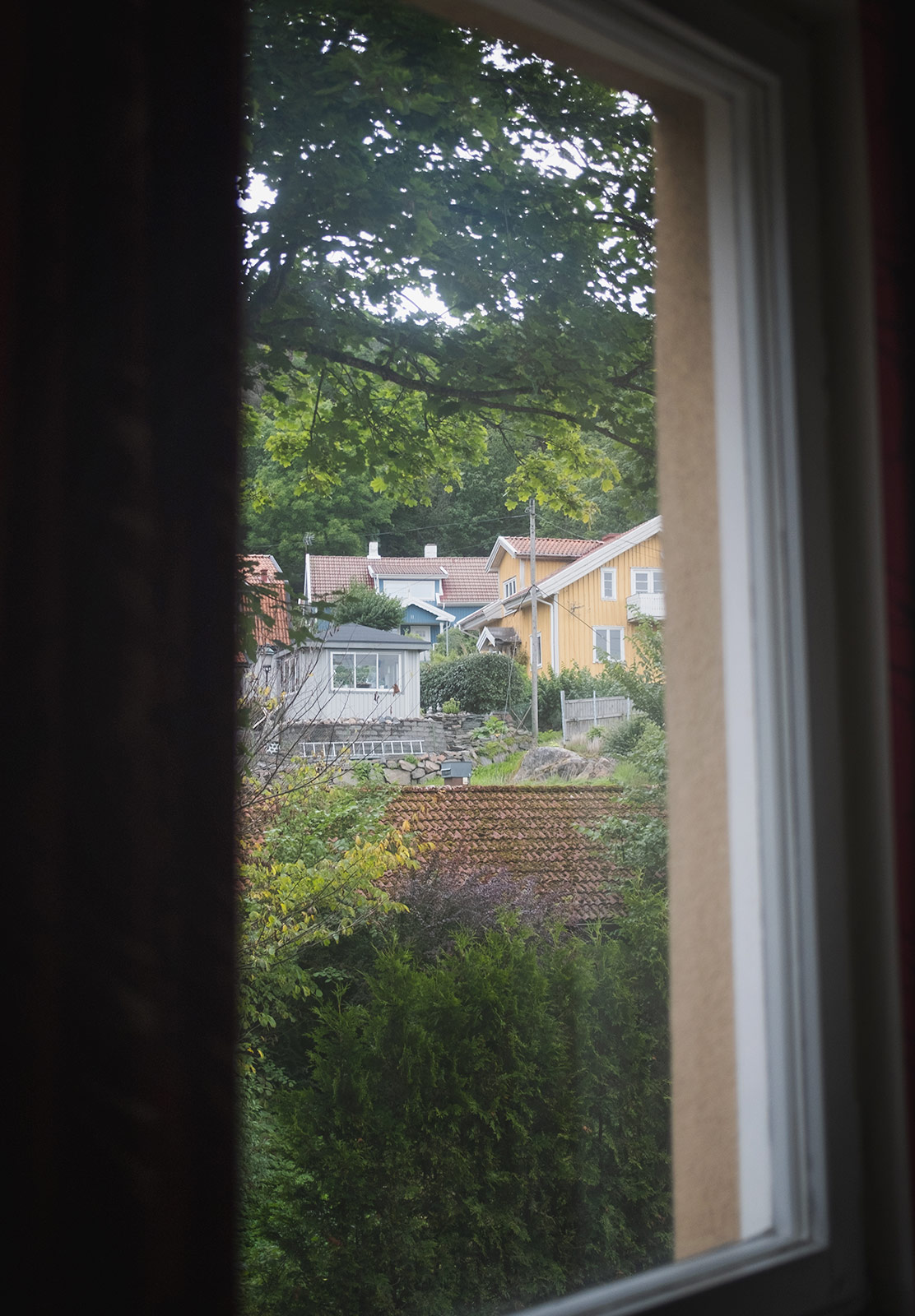 View of houses through window