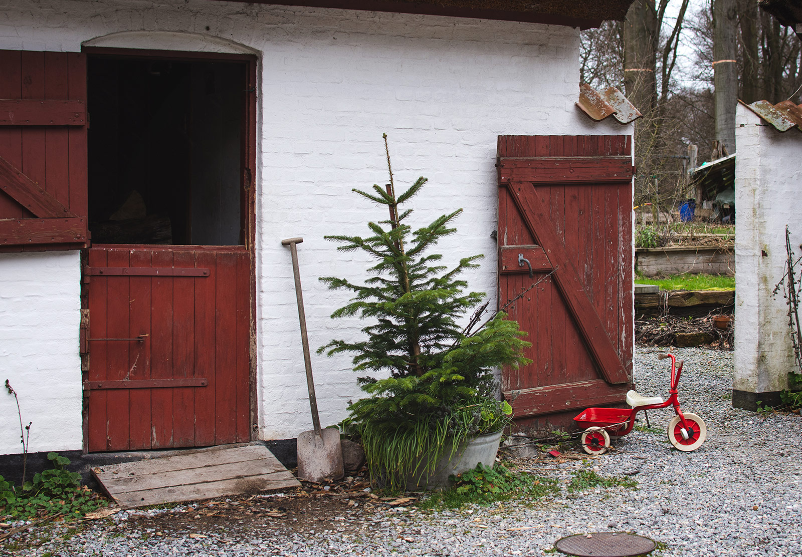 White building with red door