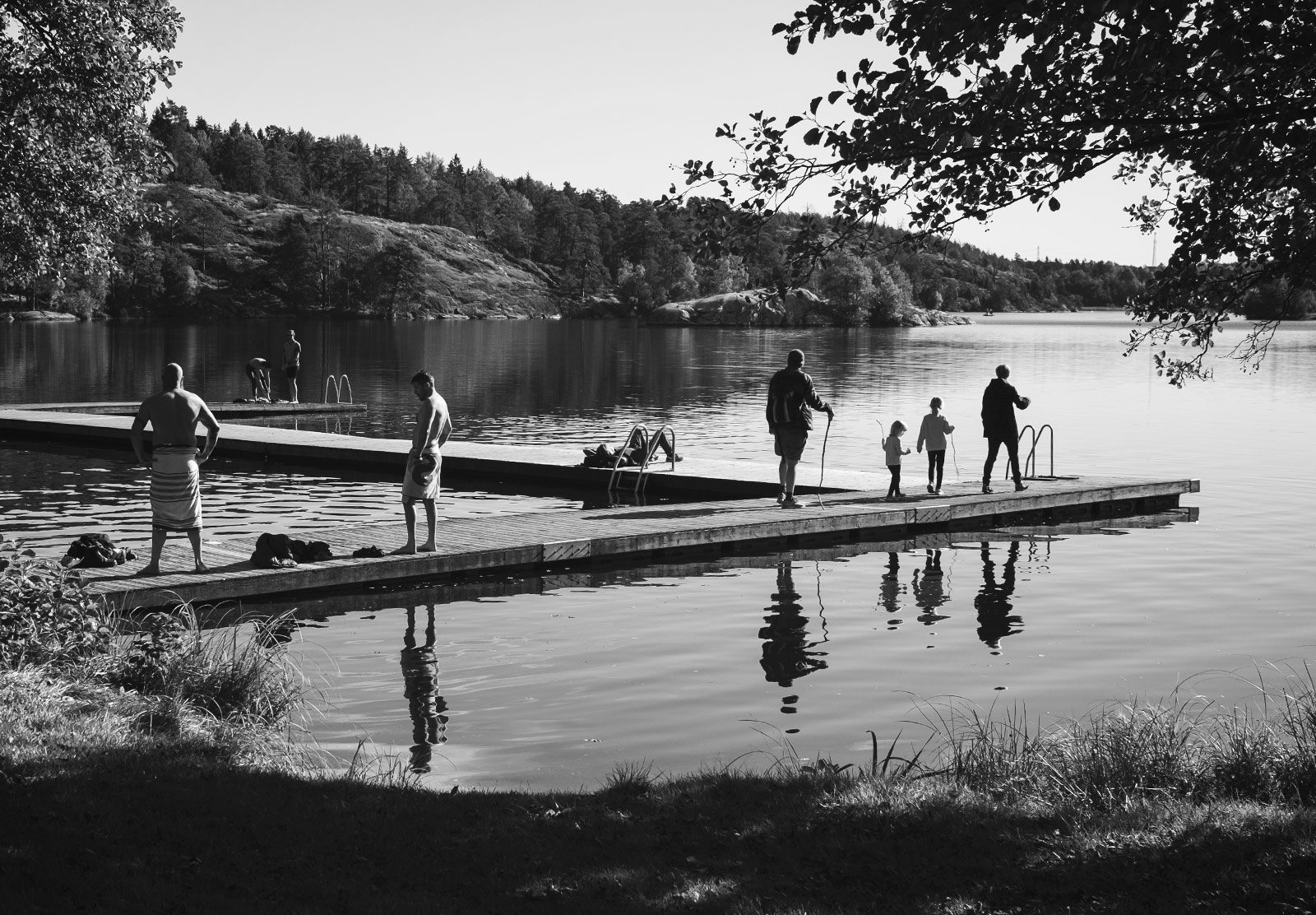 Swimmers on jetty