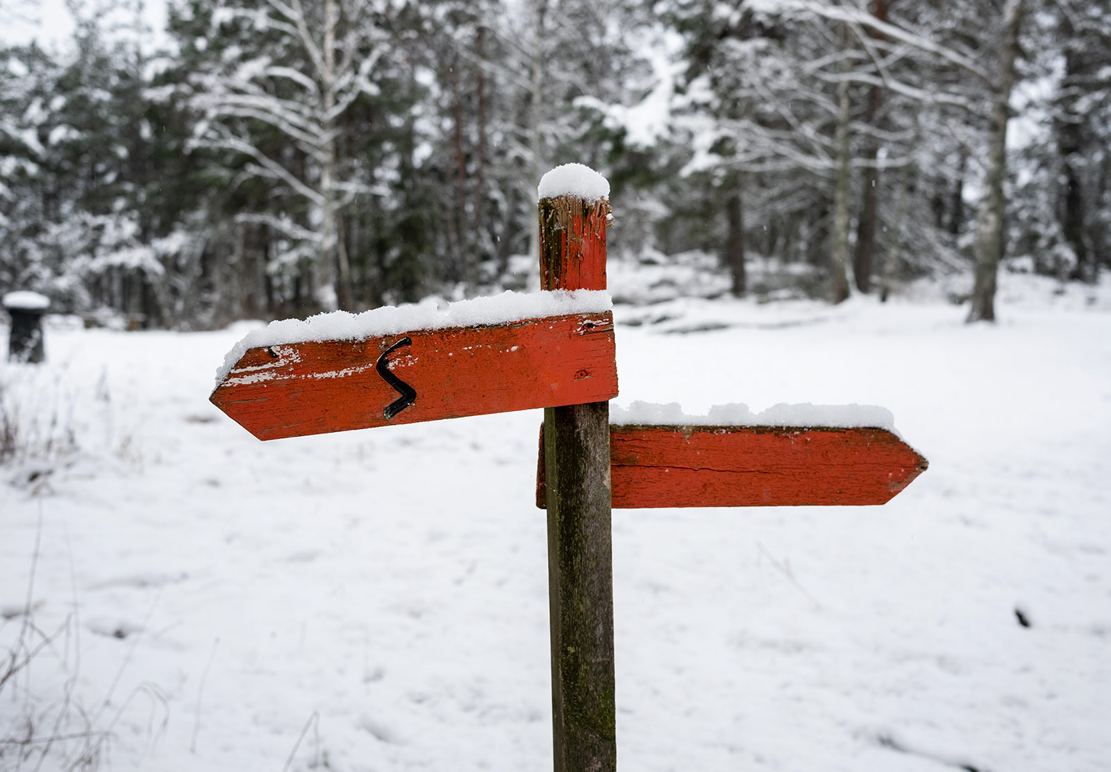 Red wooden sign