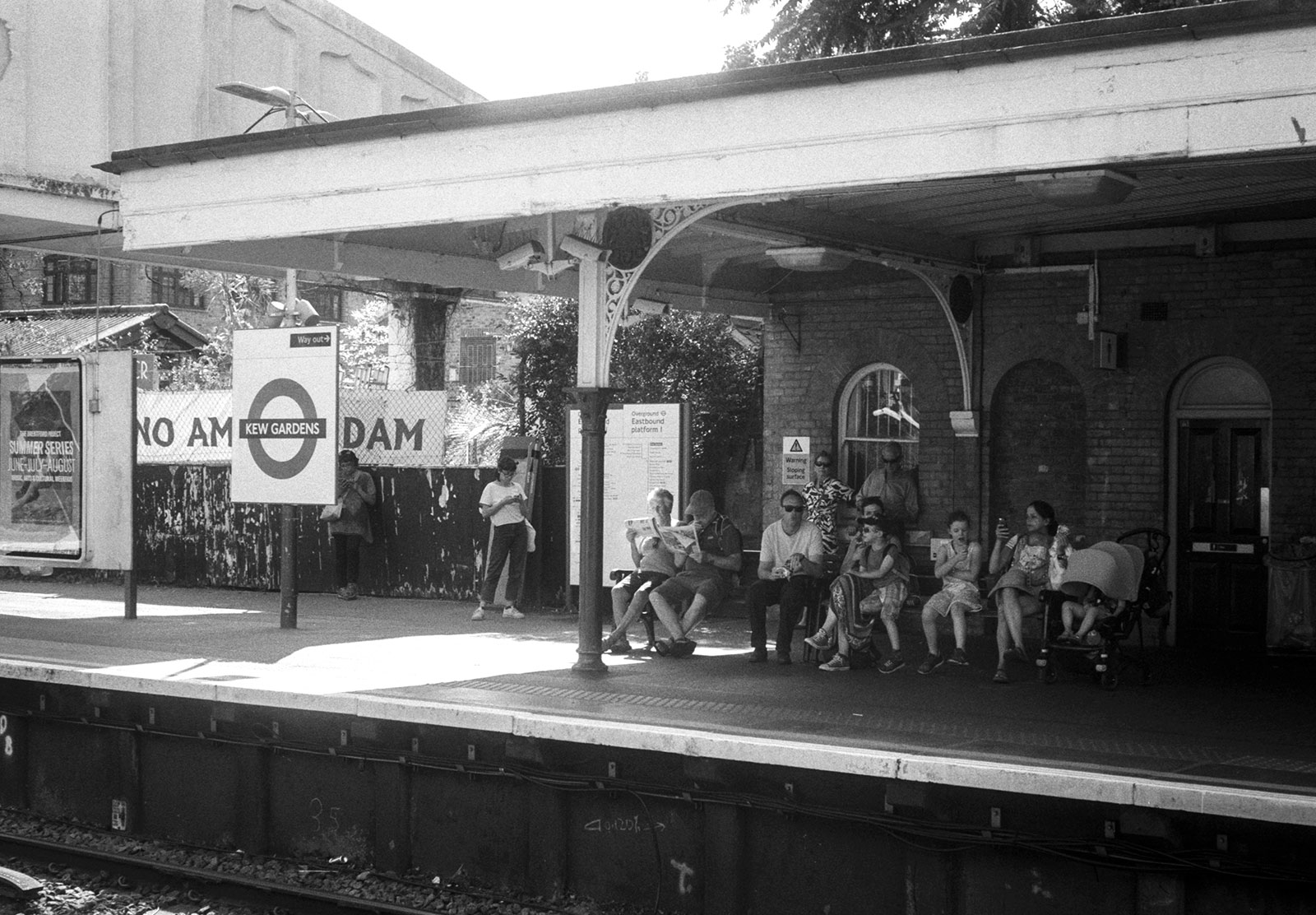 People sat at train station