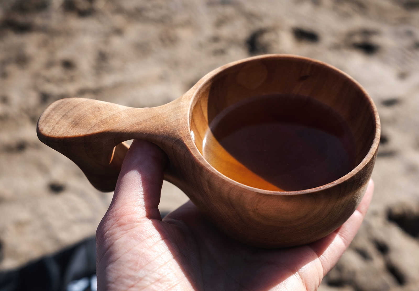 Tea in wooden cup