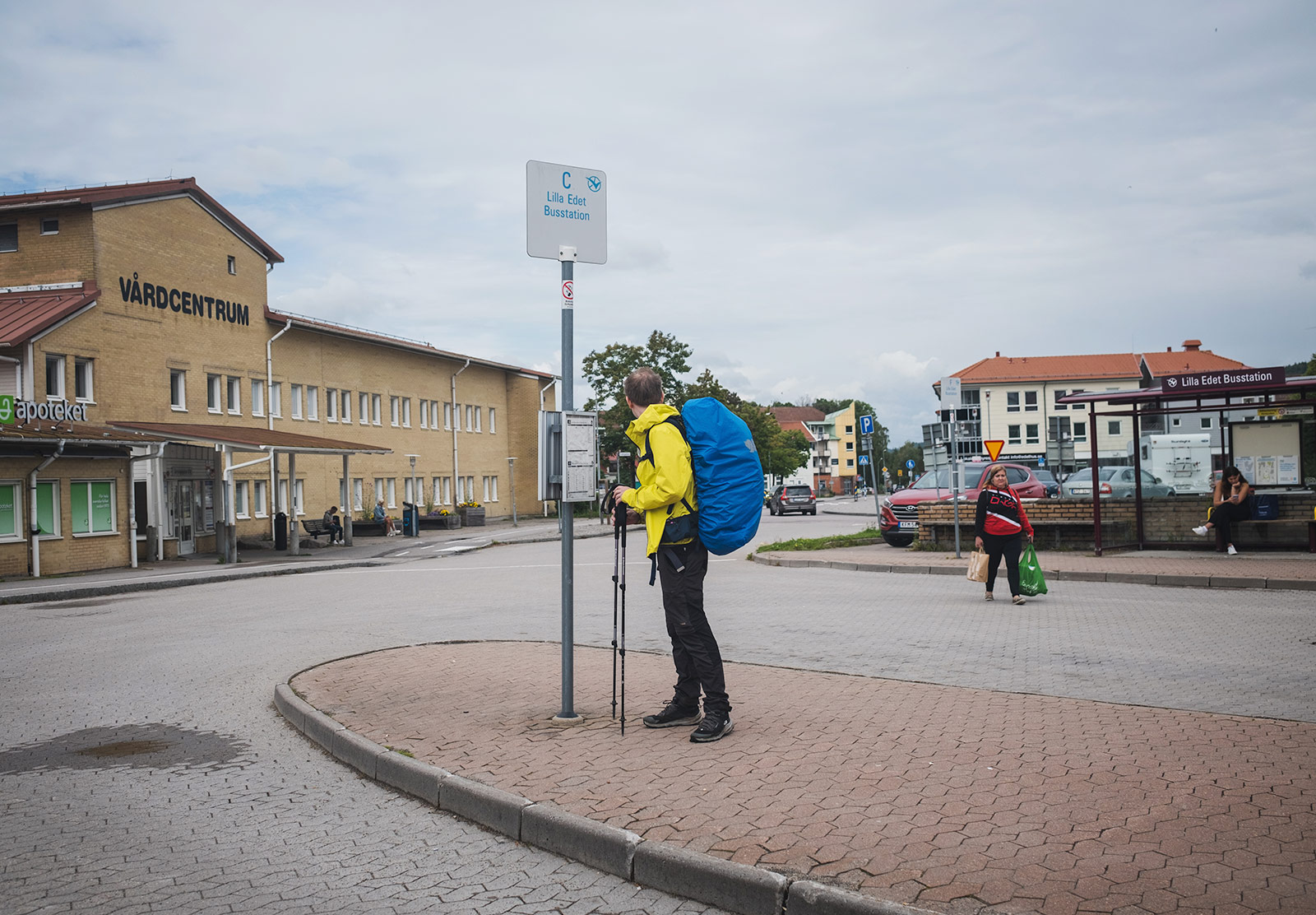 Man waiting at bus stop
