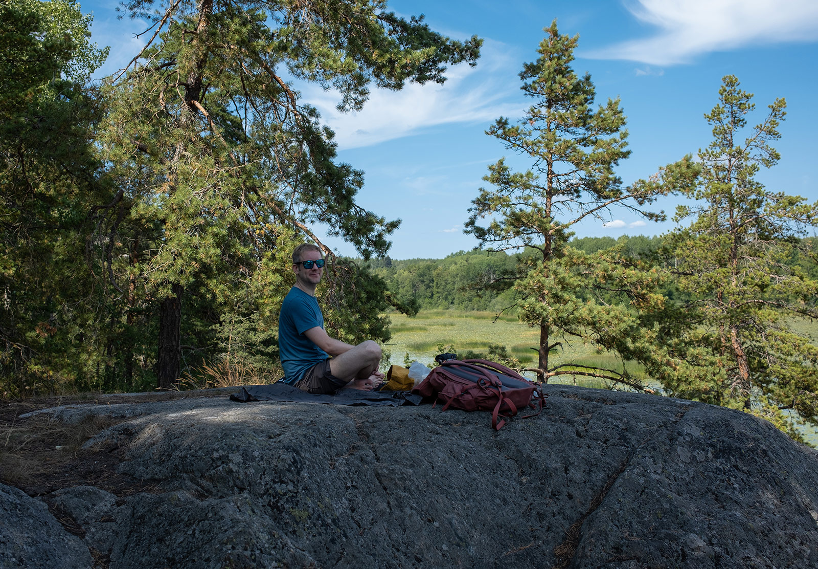 Man sitting on rock