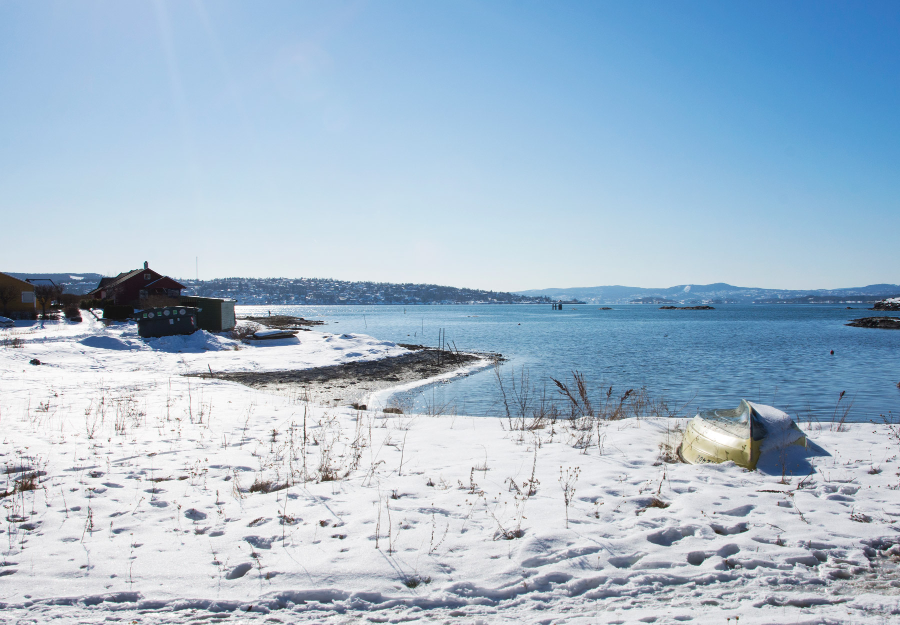 Boat in snow covered beach