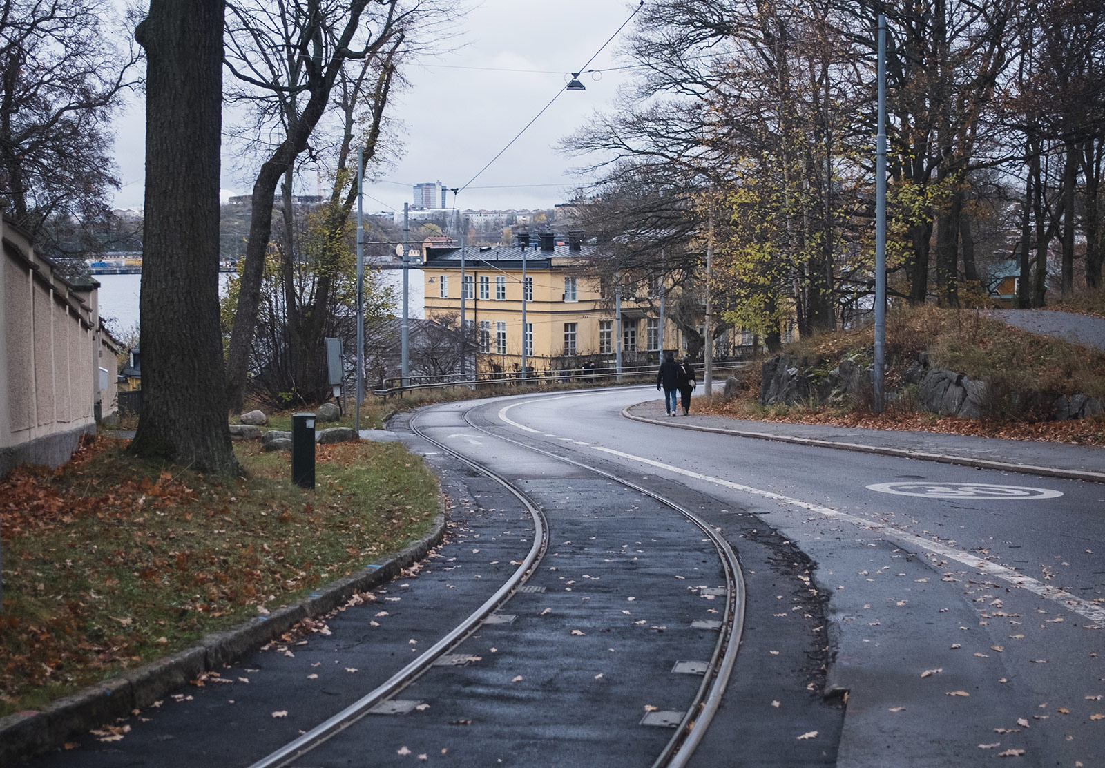 People walking along path